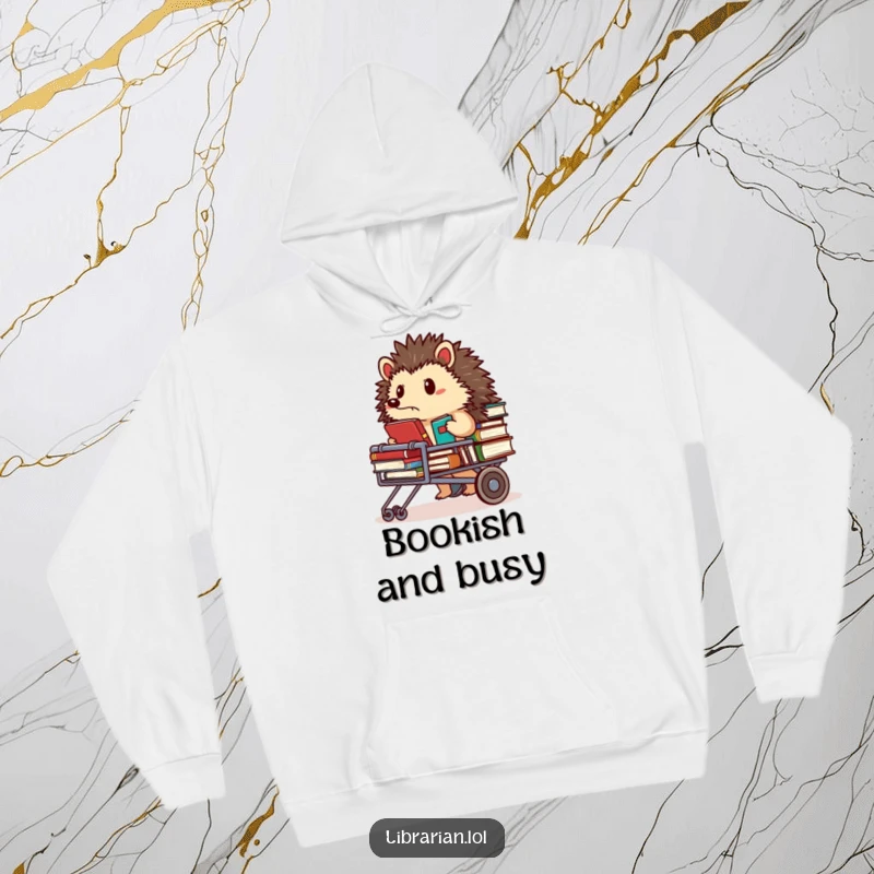 Funny Hoodie: Determined hedgehog librarian pushing a cart full of books, looking very focused, soft and warm.