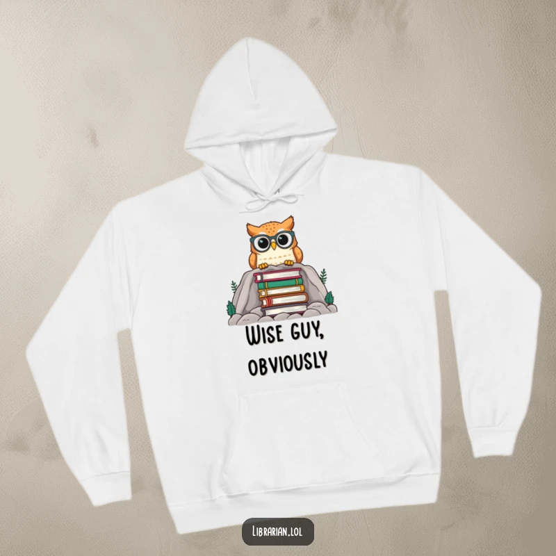 Funny owl with spectacles peeking over a mountain of books, depicted on a soft hoodie for a warm, humorous, and intellectual feel.