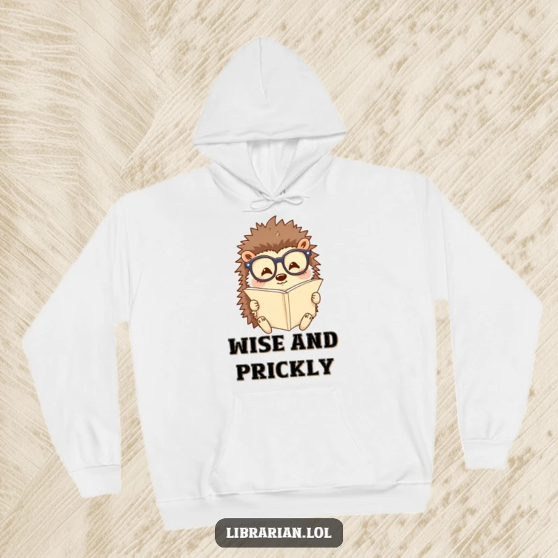 Funny hoodie with a happy hedgehog wearing reading glasses and studying a tiny scroll. Comfortable and humorous attire for intellectuals.